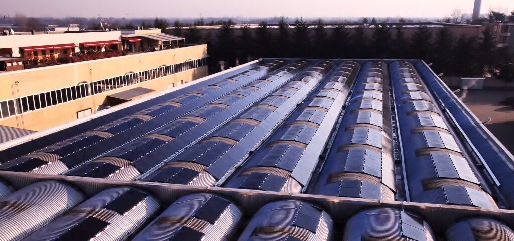 Industrial roof with photovoltaic plant at Burago