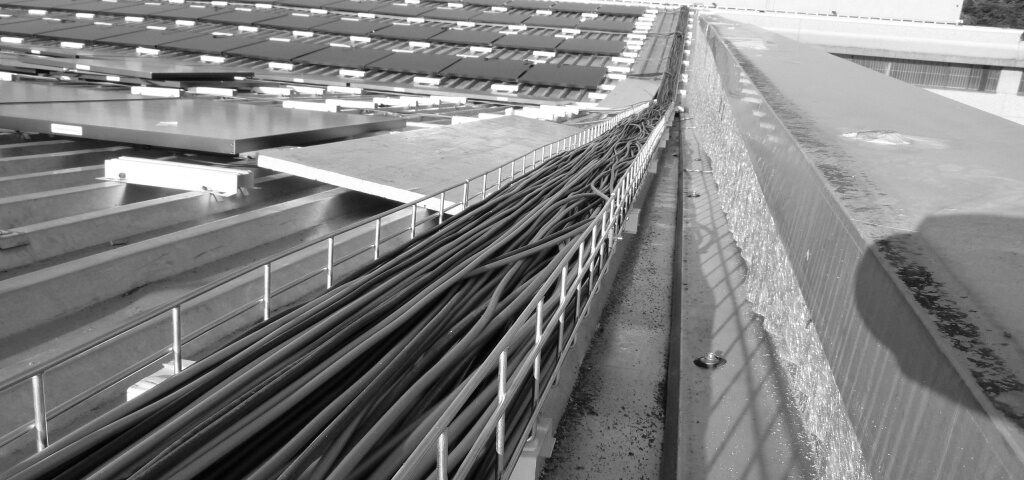 Rows of photovoltaic modules on a roof